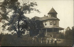 Group of People in Front of Victorian House Postcard
