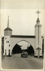 Car Driving through an Archway in Quebec, Canada Postcard