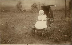 Baby Wearing White in Stroller Postcard