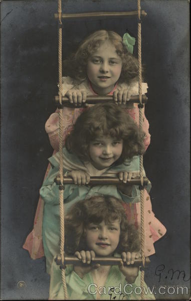 Three Girls Peeking Through a Rope Ladder