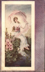 A Woman in a Flower Garden in the Spring Postcard