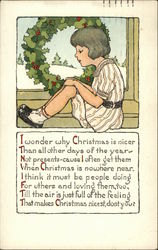 Young Girl in Striped Dress Sitting by Wreath in a Window Postcard