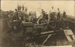Men Posing Atop An Overturned Locomotive After A Wreck Postcard