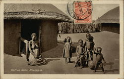 Native Huts and Residents Postcard