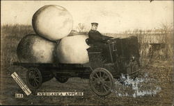 Man Driving Truck with Giant Apples Man Driving Truck with Giant Apples