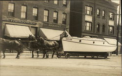 Horse Team Pulling Boat "Antler" Through Town - J.J. Quilty Grocery Horse Team Pulling Boat "Antler" Through Town - J.J. Quilty Grocery