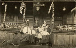 Women and Girls Sitting On Patriotically Decorated Porch of The Pines Postcard