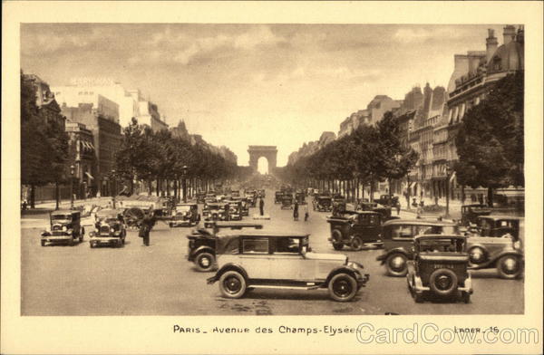 Car Traffic Along The Avenue Des Champs-Elysèes Paris France