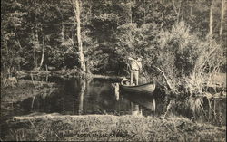 Man in Canoe Postcard