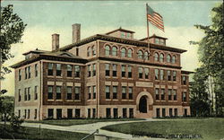 The High School Building, With Flag Flying Postcard