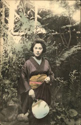 Japanese Woman in a Garden Postcard