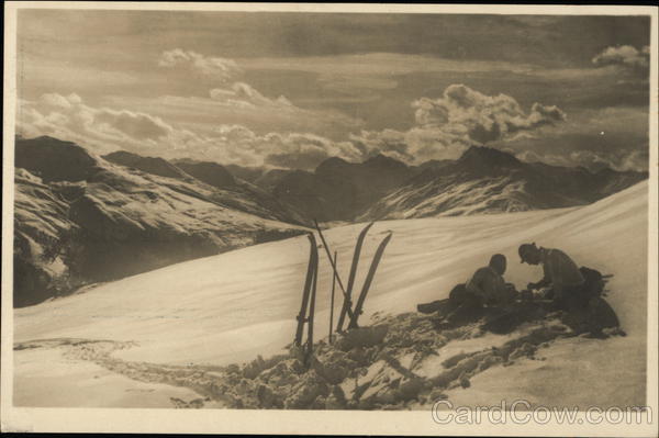 Black and white photo of skiers taking a rest Switzerland