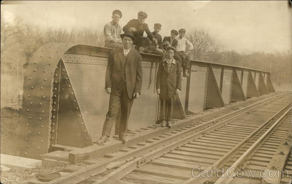 Men Standing on Railroad Bridge Railroad (Scenic)