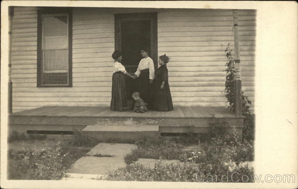 Little Girls and Baby on the Poarch Longmont Colorado