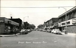 Street Scene of Business District Postcard