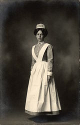Woman in Maid's Uniform Postcard
