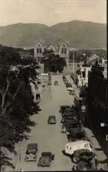 View of Street With Lots of Cars Postcard