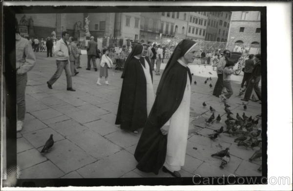 Nuns in Courtyard Women