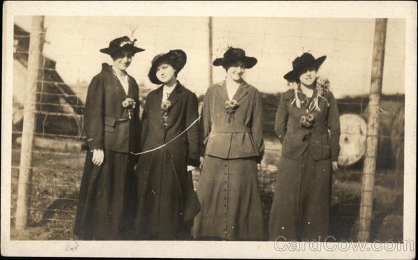 Four Women By Fence