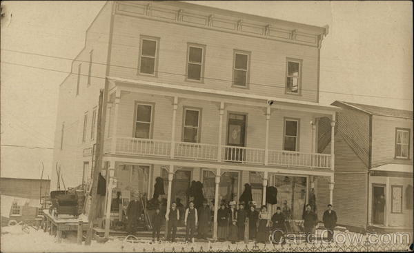 People Gathered in Front of Three-Story Building Brownsburg QC Canada