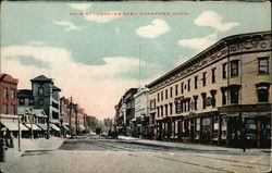 Main Street looking East Postcard