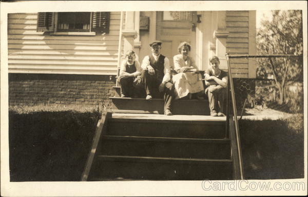 A Family Posing on the Front Steps of their Home New Britain Connecticut