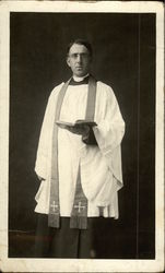Priest Holding Bible Postcard