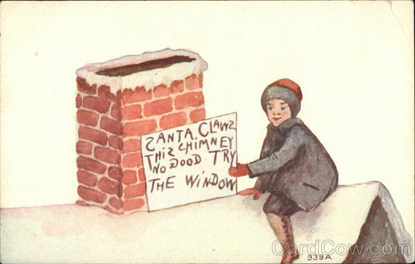 Boy Holding Sign for Santa on Roof Children