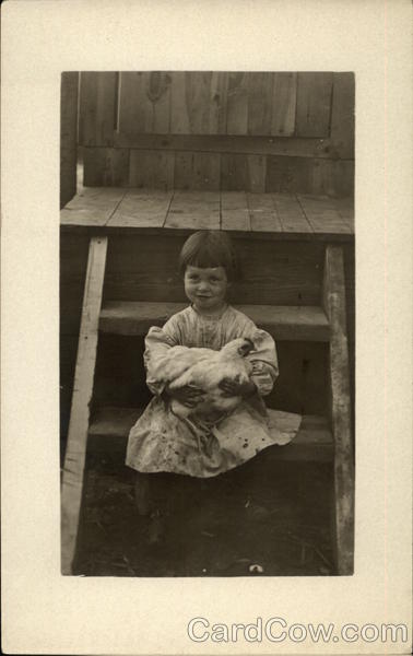 Edith B. Holding Chicken on Stairs Girls