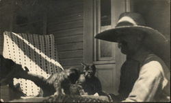 Man in Hat and Cats Man in Hat and Cats
