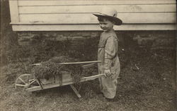 Farmer Boy Pushing Cart Postcard