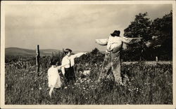Children in Field Pointing at Scarecrow Children in Field Pointing at Scarecrow