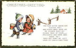 Christmas Greeting Two Children with Toys in Snow Postcard