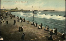 Rolling Chairs on the Boardwalk Postcard