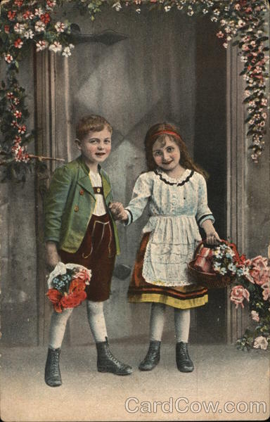 A By and Girl Holding Flowers Children