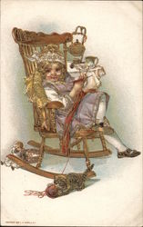 A Young Girl Sitting in a Rocking Chiar Girls Postcard Postcard