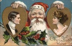 "Best Christmas Wishes" Santa Holding Pictures of Man and Woman Santa Claus Postcard Postcard