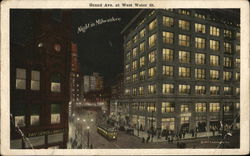 Grand Ave. at West Water St. at Night Postcard