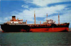 A modern tanker takes on oil at Tanker Island Postcard