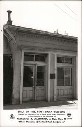 First Brick Building in Nevada City Postcard