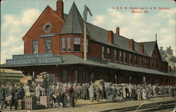 C. & N. W. Station and U. of W. Students Postcard