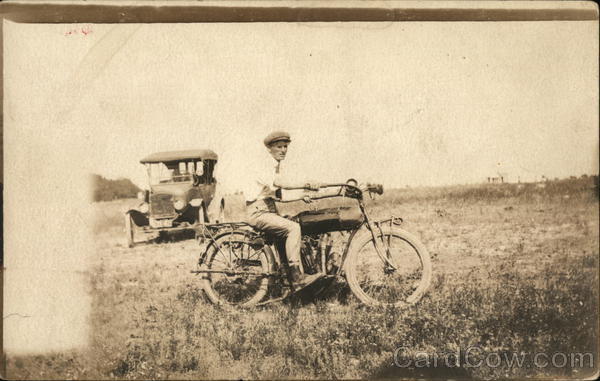 Man on Motorcycle in Field Motorcycles