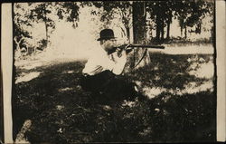 Man Shooting Rifle Postcard