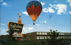 Balloon Above Holiday Inn Postcard