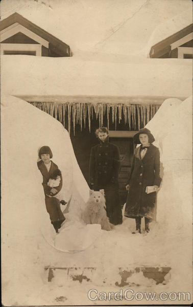 Woman, children and dog in lots of snow Ainsworth Iowa