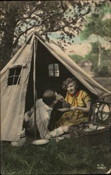 Couple Picnicking in a Tent Couple Picnicking in a Tent