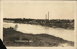 View of Town and River Postcard