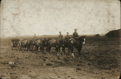 Soldiers on Horses Pulling Cart Postcard