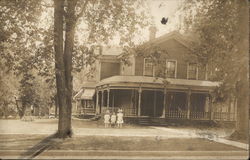 Siblings Posing In Front of Home Postcard