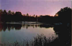 As The Sun Sets Over The Lake Postcard